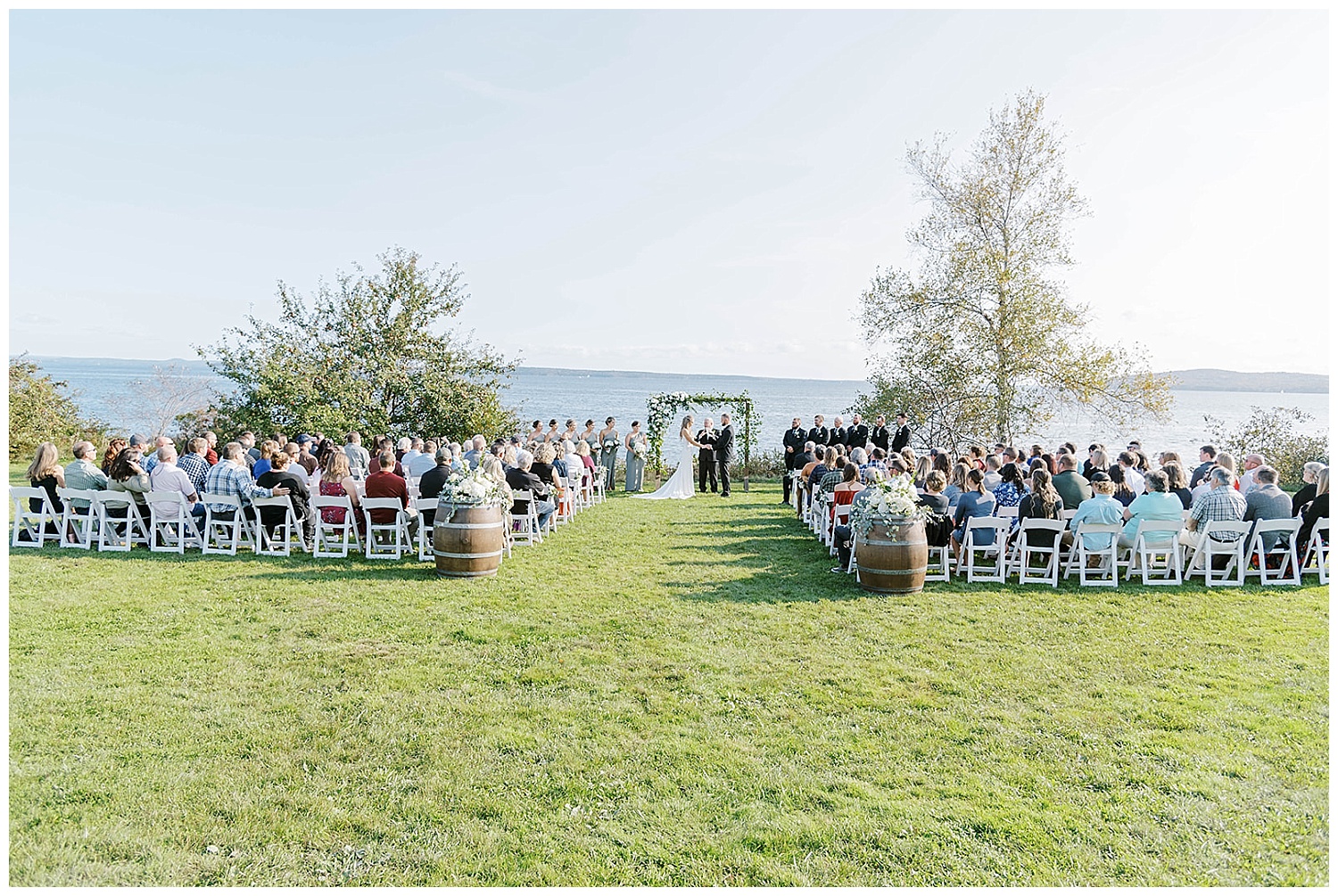 wide shot of wedding ceremony at portside manor in maine