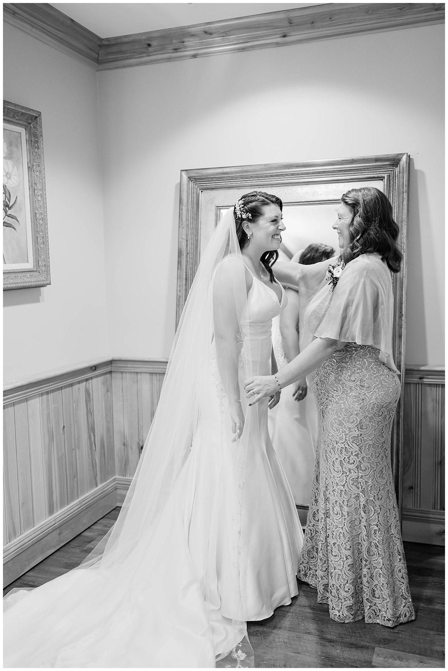 mom and bride having a special moment at Maine wedding