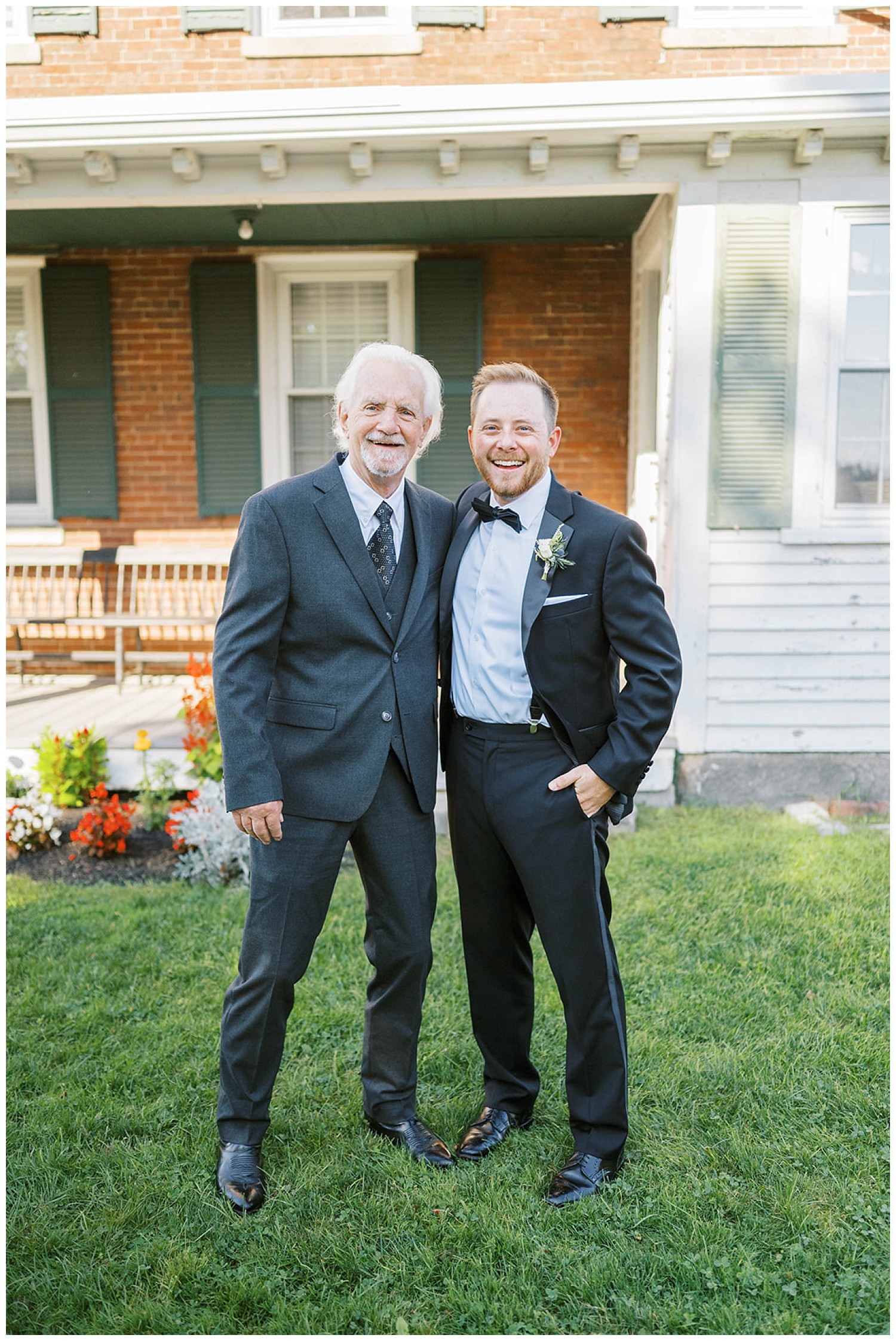 groom posing with his granddad at wedding in Maine