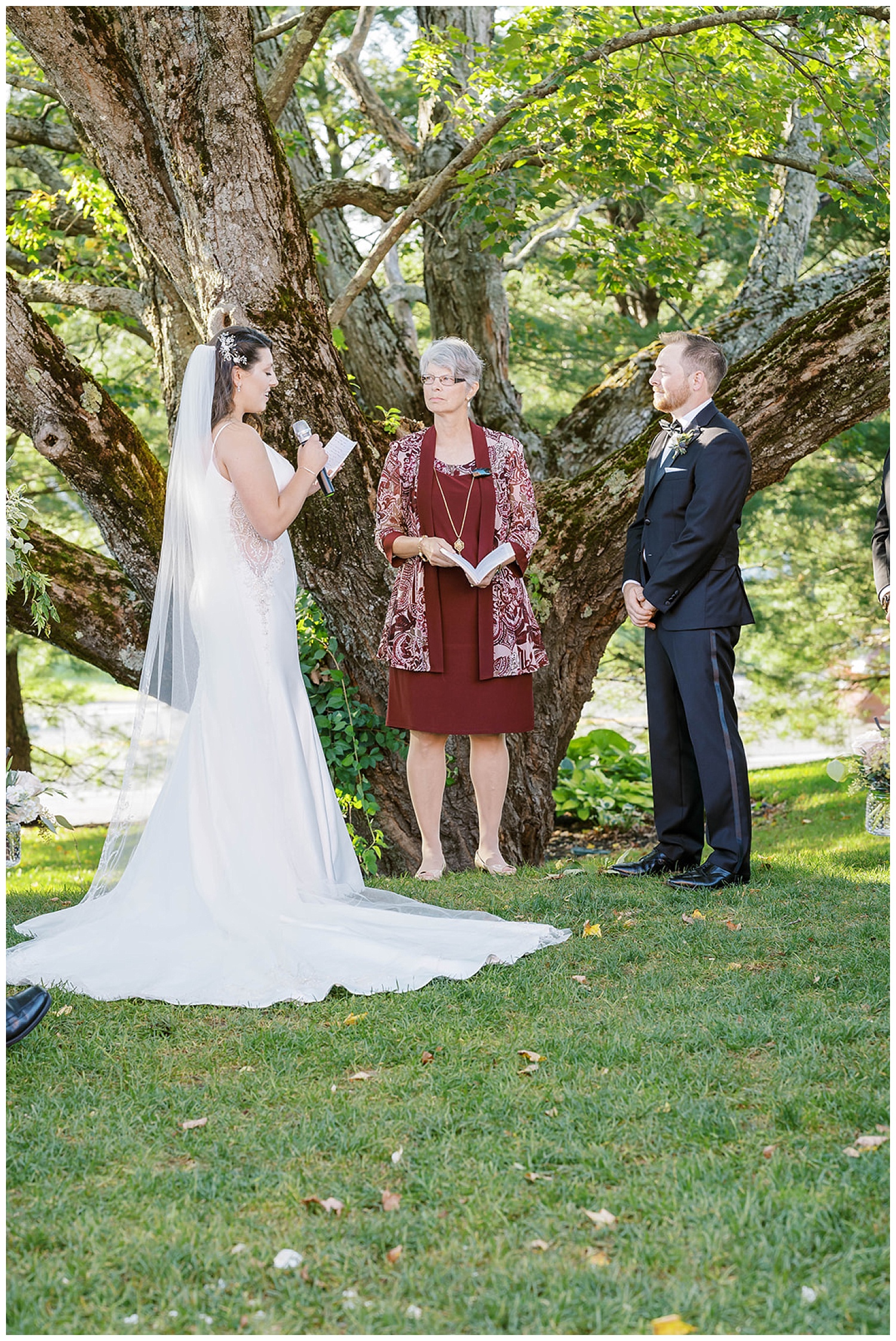bride reading vows to groom at wedding ceremony