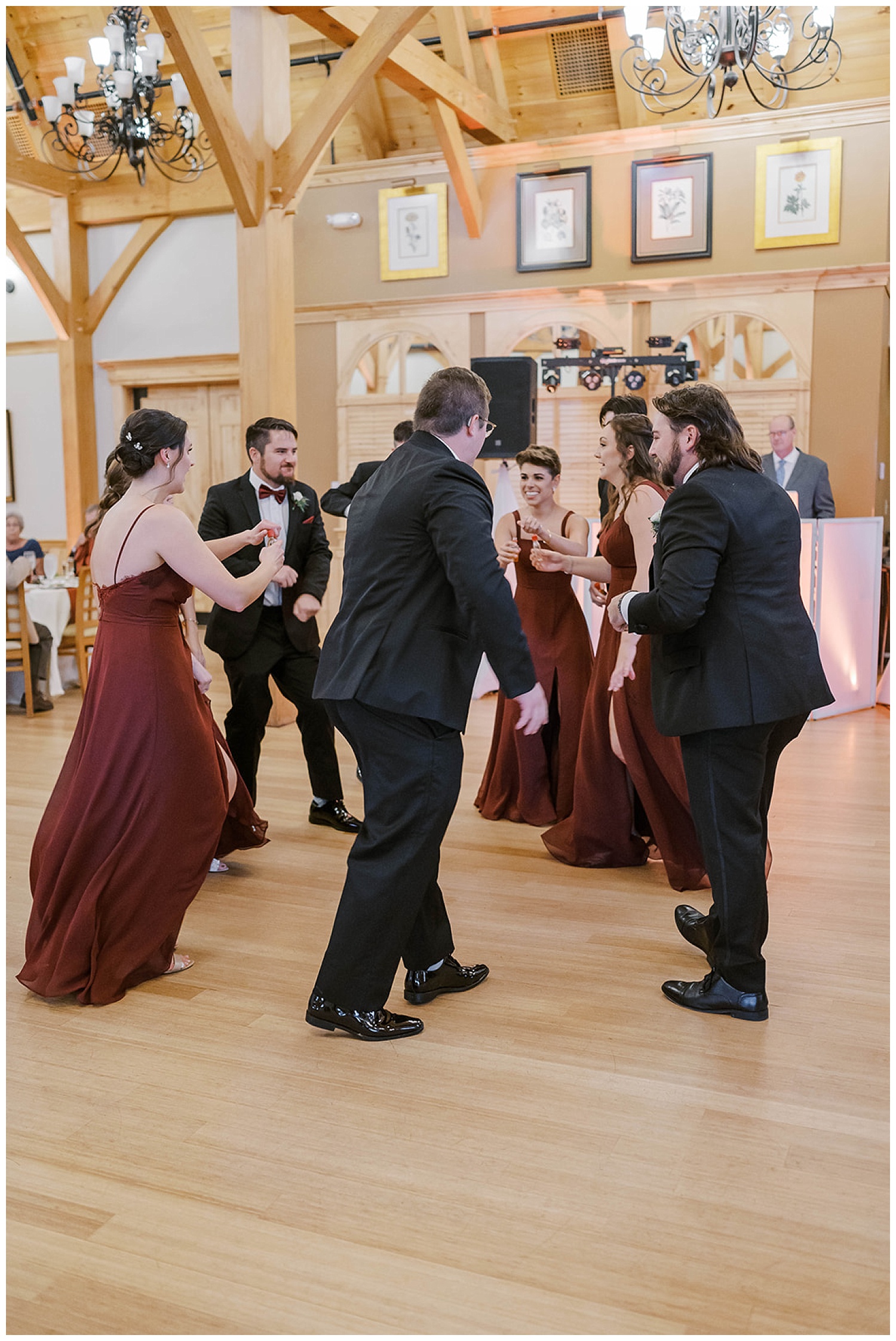 bridal party toasting at Maine reception