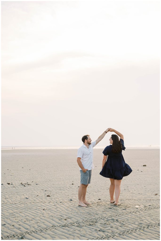 couple dancing on the sand at Mayflower Beach