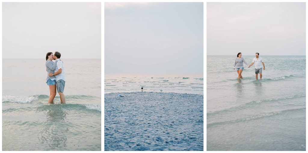 couple walking in the water at Cape Cod beach engagement