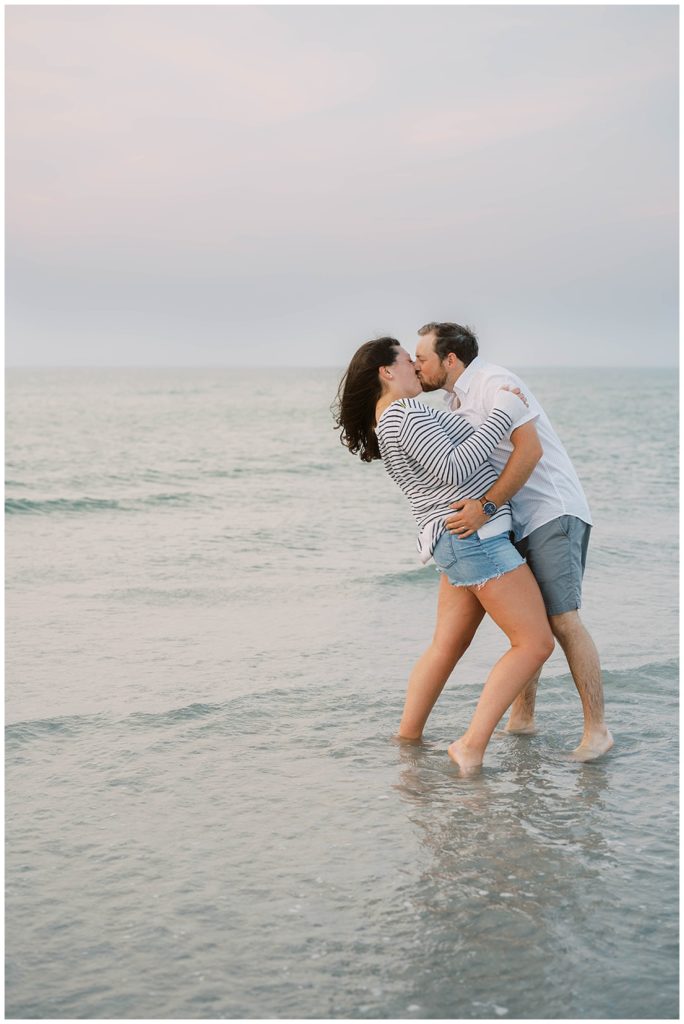 couple kissing at Cape Cod engagement session