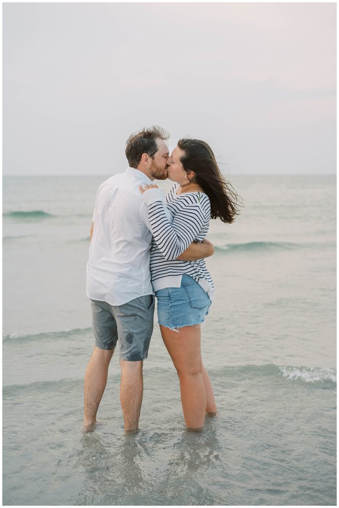 couple kissing in the water at Cape Cod beach session