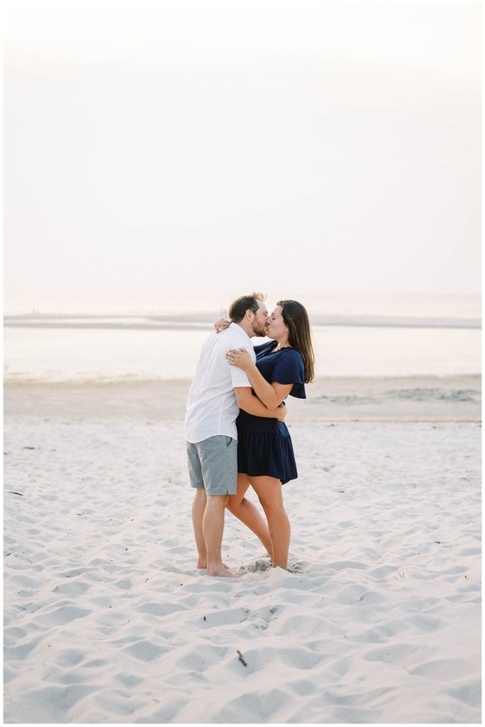 couple kissing at beach session at Cape Cod