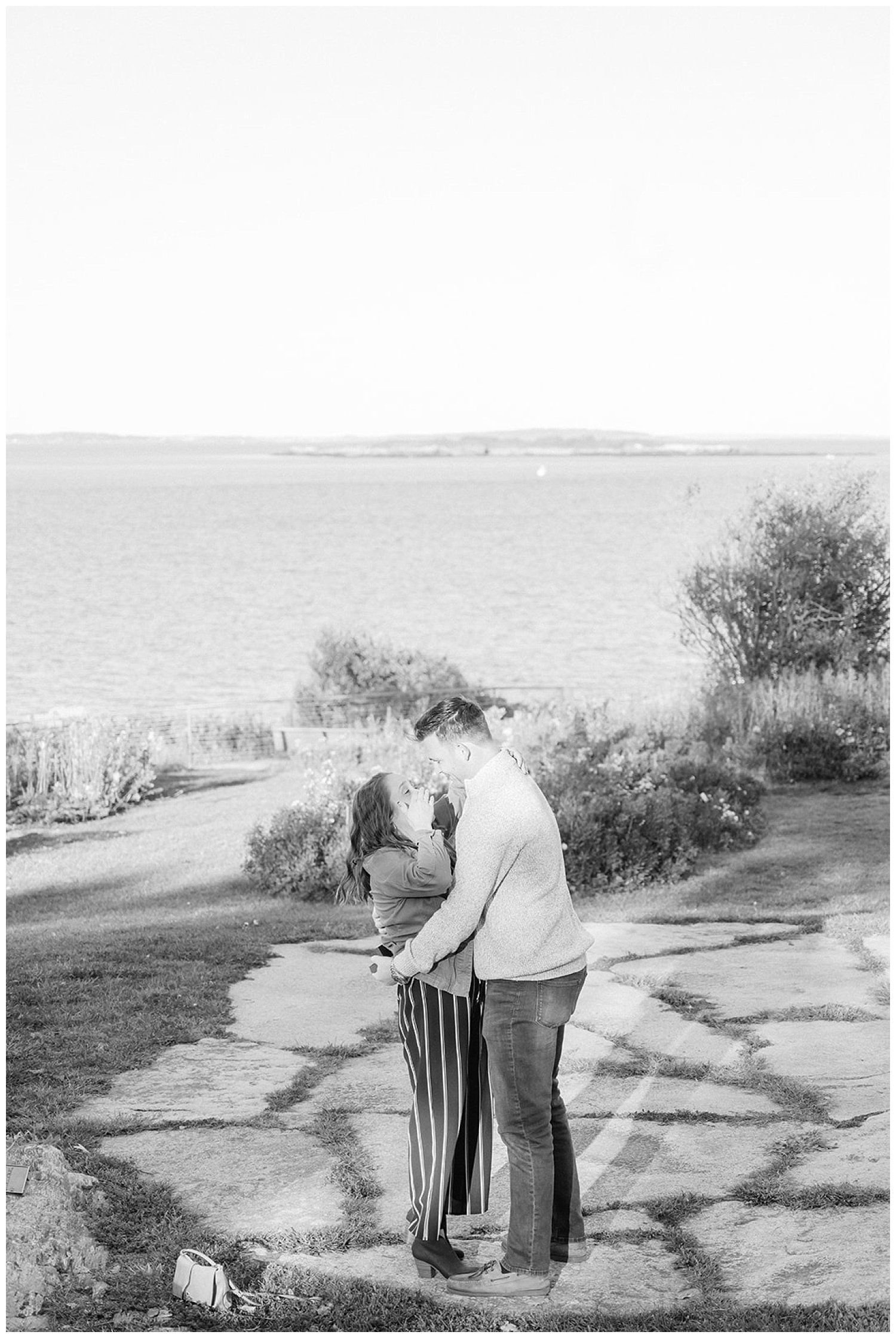 girlfriend hugging her boyfriend after proposal at Fort Williams Park