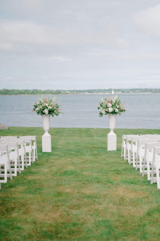 Oceanfront ceremony setup at a private estate in Newport, Rhode Island.