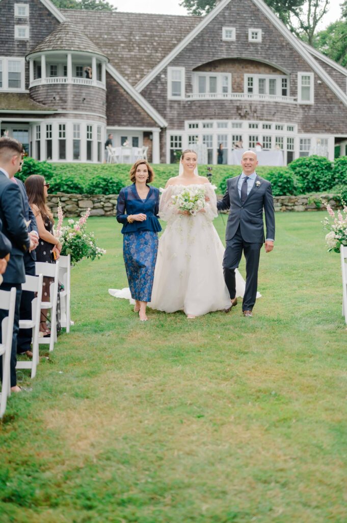 Romantic outdoor wedding ceremony by the sea in Rhode Island.