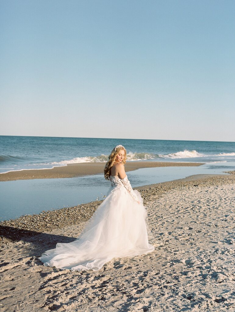 bride walks on a New England beach