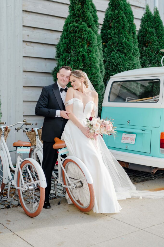 Bride and groom embracing along the oceanfront at Beauport Hotel in Gloucester MA