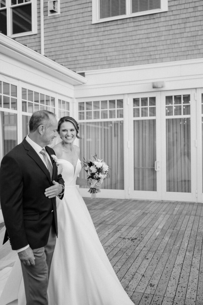 Rain falling gently during outdoor ceremony at Beauport Hotel wedding Gloucester MA