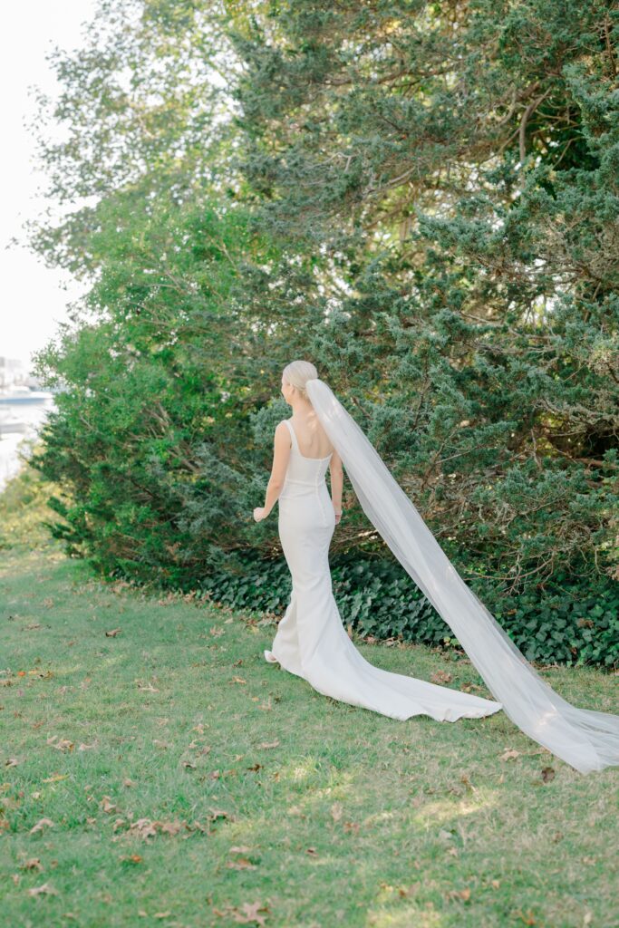 Bride walking to first look at Wychmere Beach Club wedding