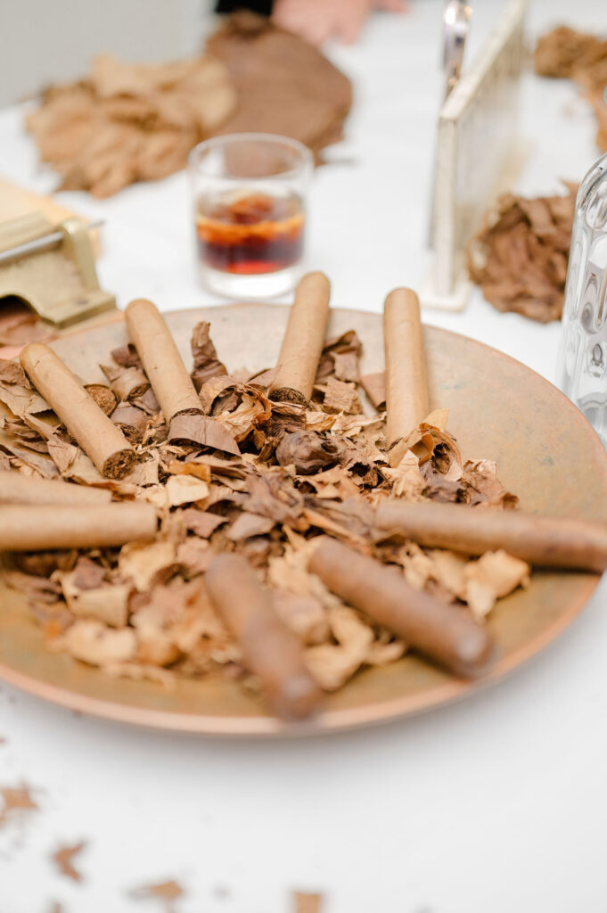Luxury cigar bar at Belle Mer wedding reception in Newport, featuring hand-rolled cigars and custom details.