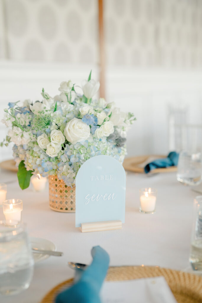 Hydrangea and rose centerpiece at luxury Cape Cod wedding reception table