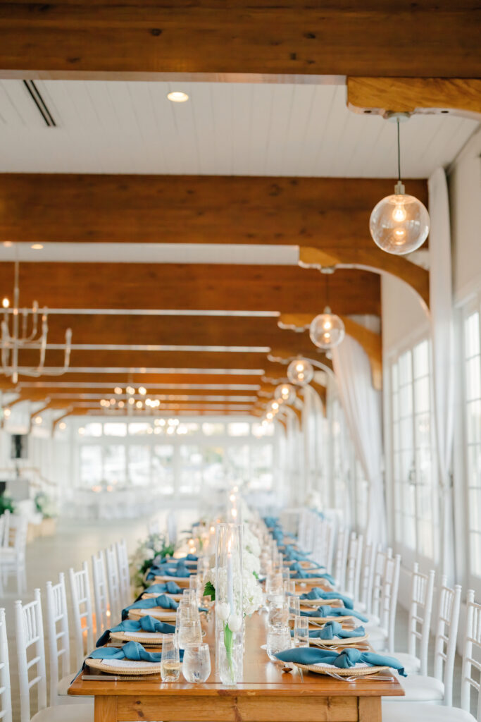 Grand reception table view in Harbor Room at Wychmere Beach Club wedding