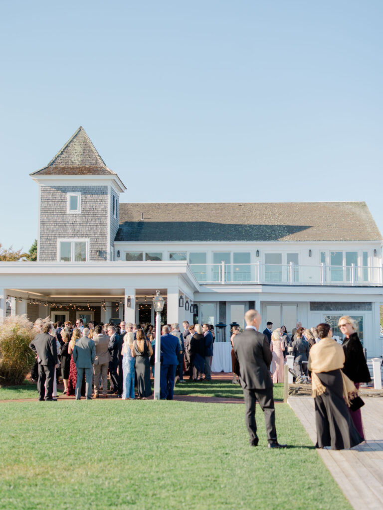 Cocktail hour mingling at Wychmere Beach Club Cape Cod wedding