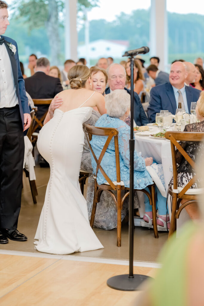 Mother hugging the bride during an emotional family moment at Wentworth by the Sea.