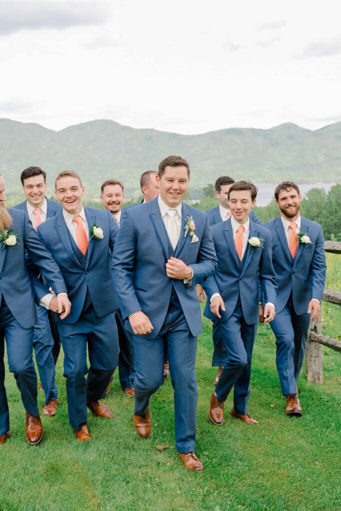 Groomsmen portraits in the meadows at Mountain Top Resort Vermont.