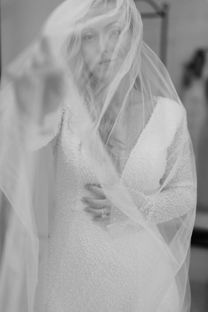 Bride sharing a quiet getting ready moment with her mother on the wedding morning at a Vermont wedding.