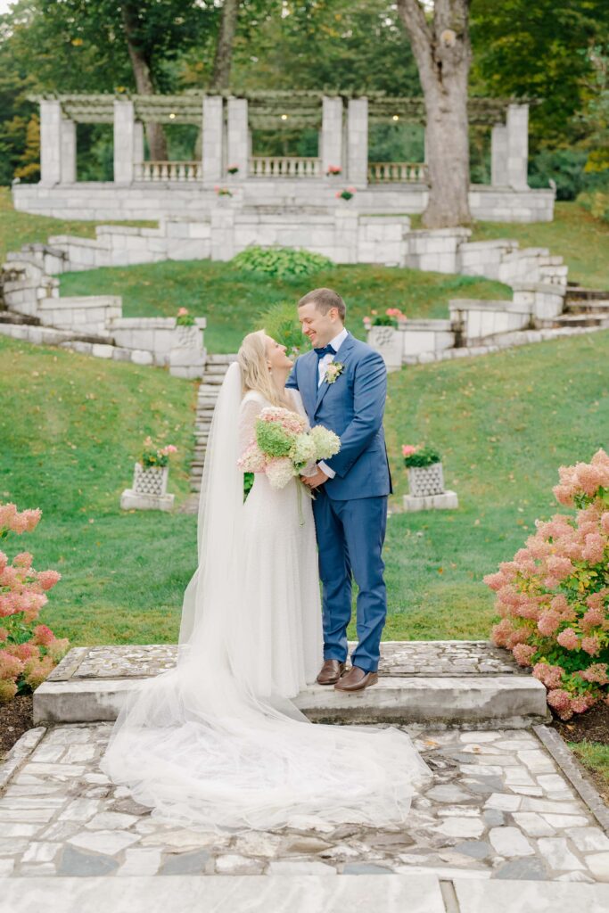 Bride and groom portraits taken at Marble House in Manchester, Vermont, surrounded by historic elegance.