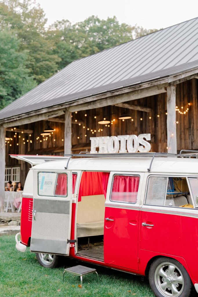 Wedding guests enjoying cocktail hour during a Vermont wedding, gathered outdoors and connecting.
