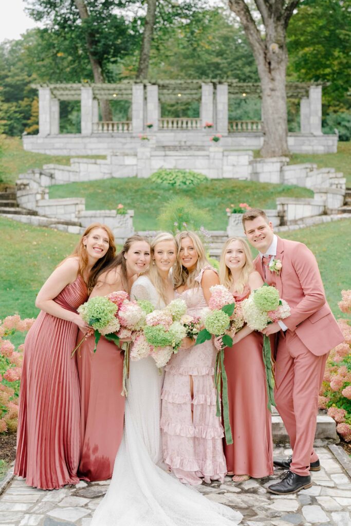 Group portraits of the wedding party at a Vermont wedding, captured in a relaxed and celebratory moment
